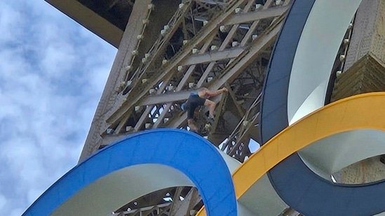 Man tries to scale Eiffel Tower on last day of Paris Olympics, arrested